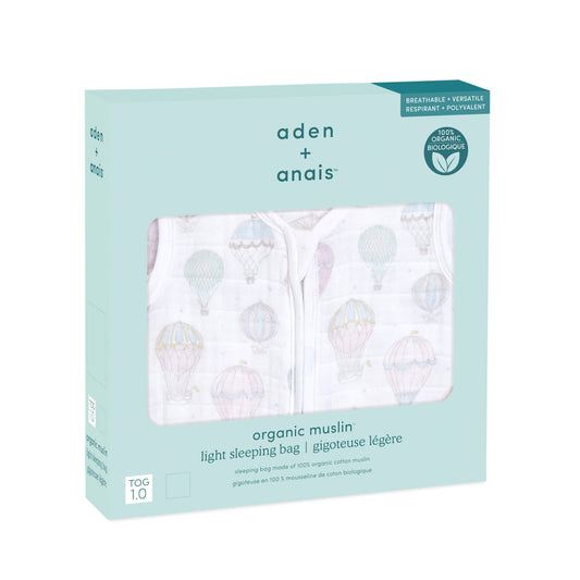 aden + anais Above the Clouds organic sleeping bag in 1.0 TOG, packaged in mint green box with pastel balloon print visible through the front window.