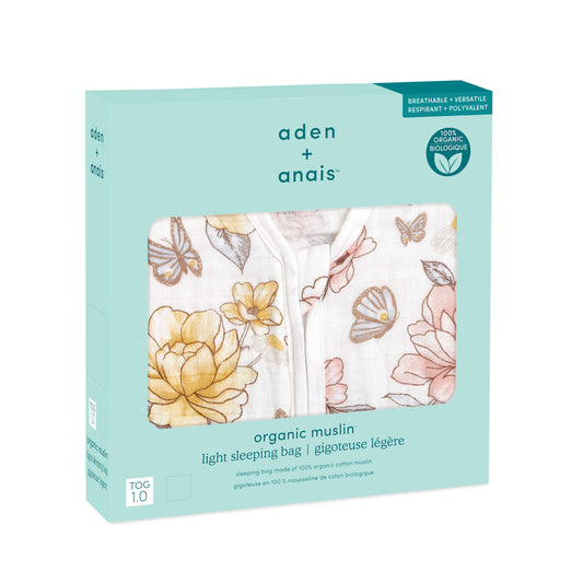 aden + anais organic cotton light sleeping bag in boxed packaging. Earthly floral design with breathable 1.0 TOG muslin.