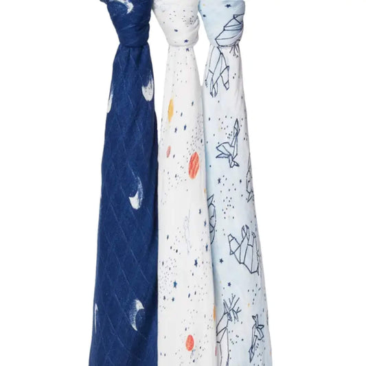 aden + anais silky soft bamboo muslin swaddles in Stargaze designs, knotted to display navy moon, planets, and constellations.