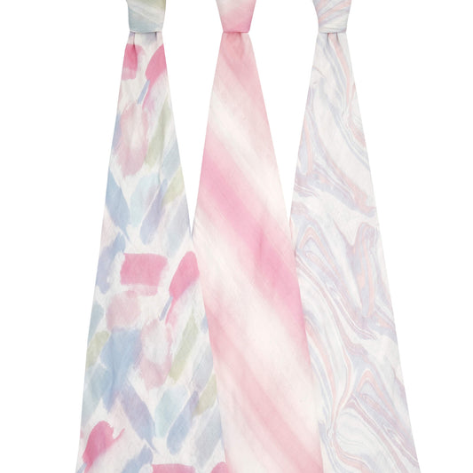 aden + anais silky soft bamboo muslin swaddles in Florentine prints, shown knotted to reveal full designs.