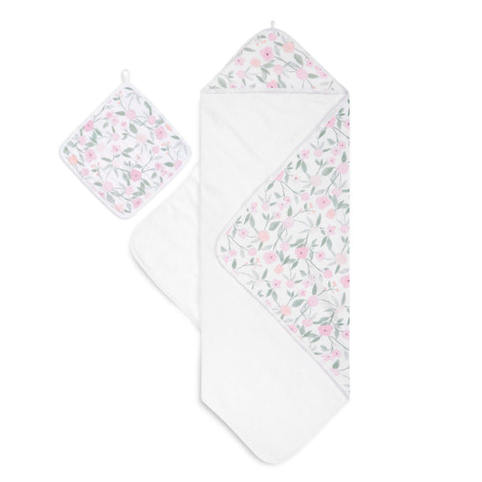 aden and anais set includes a hooded towel with a 100% muslin backing and terry cloth, along with a washcloth crafted from three layers of soft and absorbent muslin. 