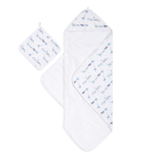 aden and anais set includes a hooded towel with a 100% muslin backing and terry cloth, along with a washcloth crafted from three layers of soft and absorbent muslin. 