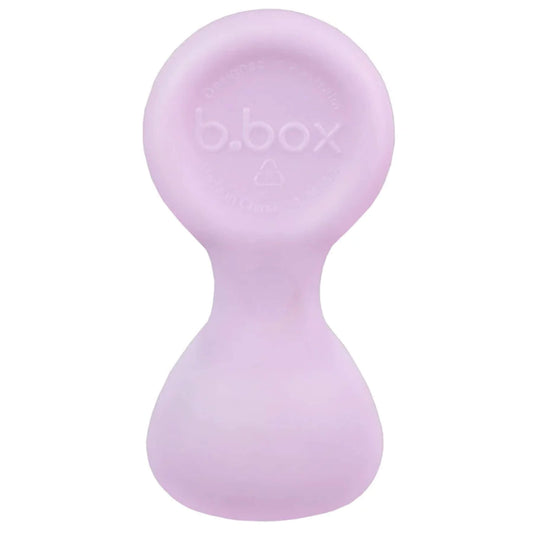 Single baby spoon shown upright in a pale purple shade with a rounded handle and wide scoop.