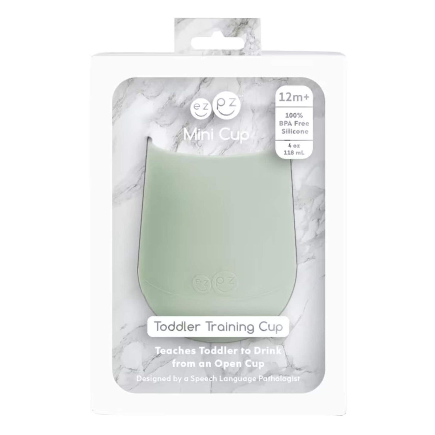 A retail box containing a sage green silicone mini training cup, labelled as BPA free and suitable for toddlers aged 12 months and older.