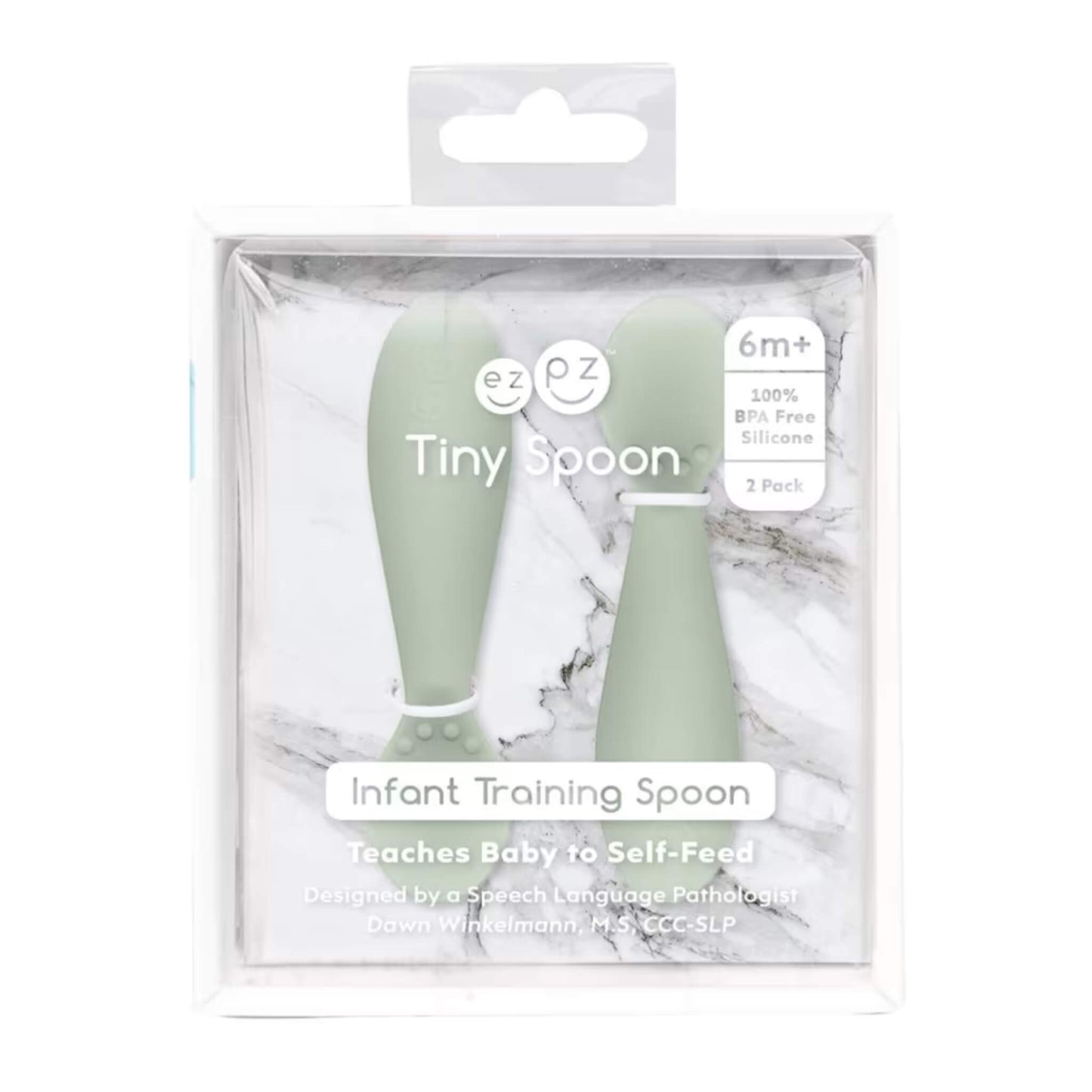 Retail packaging of Ezpz Tiny Spoons two-pack in sage green, labelled “Infant Training Spoon” with product details on clear display box.