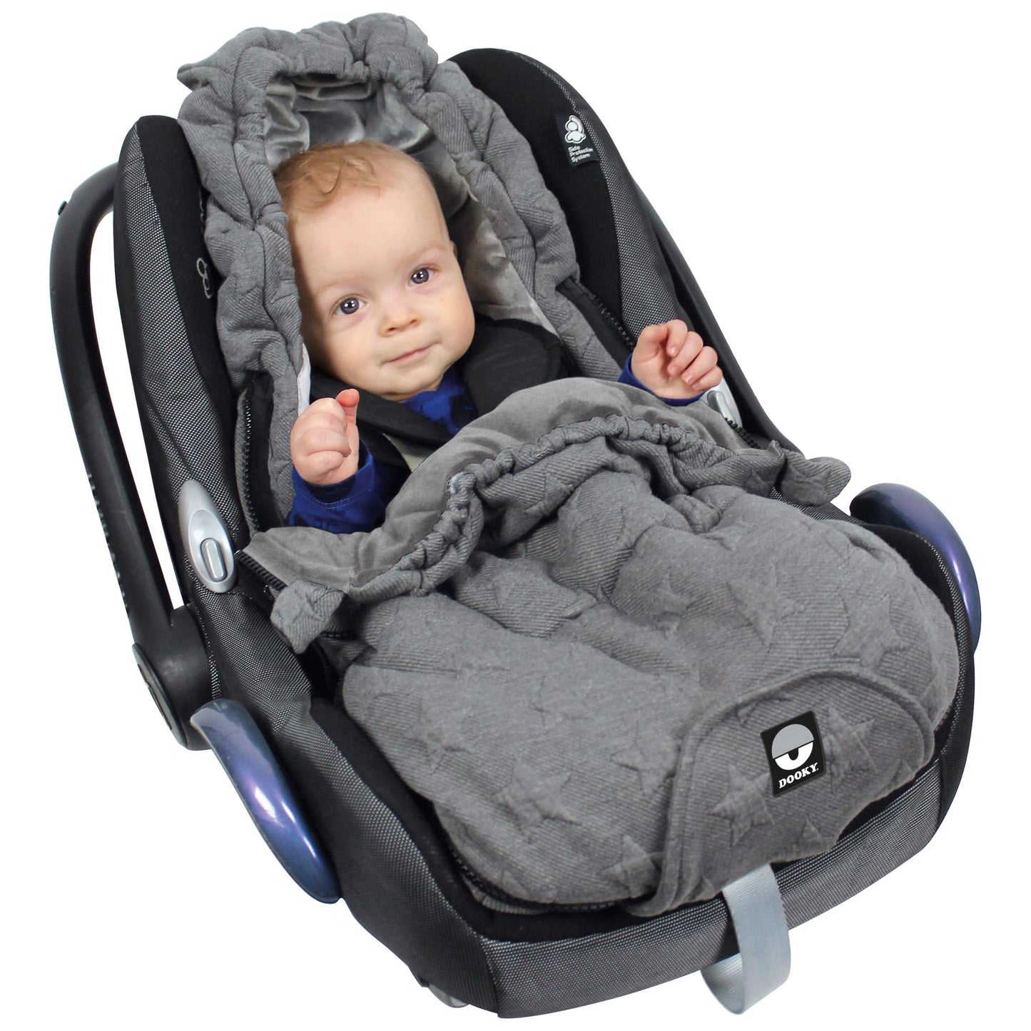 A baby seated in a car seat, snugly tucked into a grey footmuff with the hood drawn up around their head and the quilted fabric wrapped over their legs.