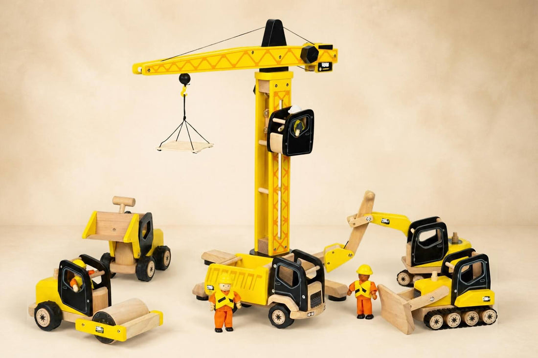 Tidlo wooden construction toys with tower crane, digger, bulldozer, road roller, tipper truck and builder figures.