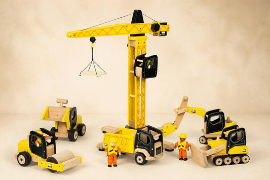 Tidlo wooden construction toys with tower crane, digger, bulldozer, road roller, tipper truck and builder figures.