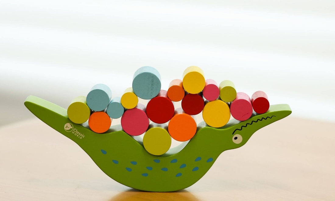 Colourful wooden crocodile balancing toy from Classic World, included in a Bebeco blog spotlight.