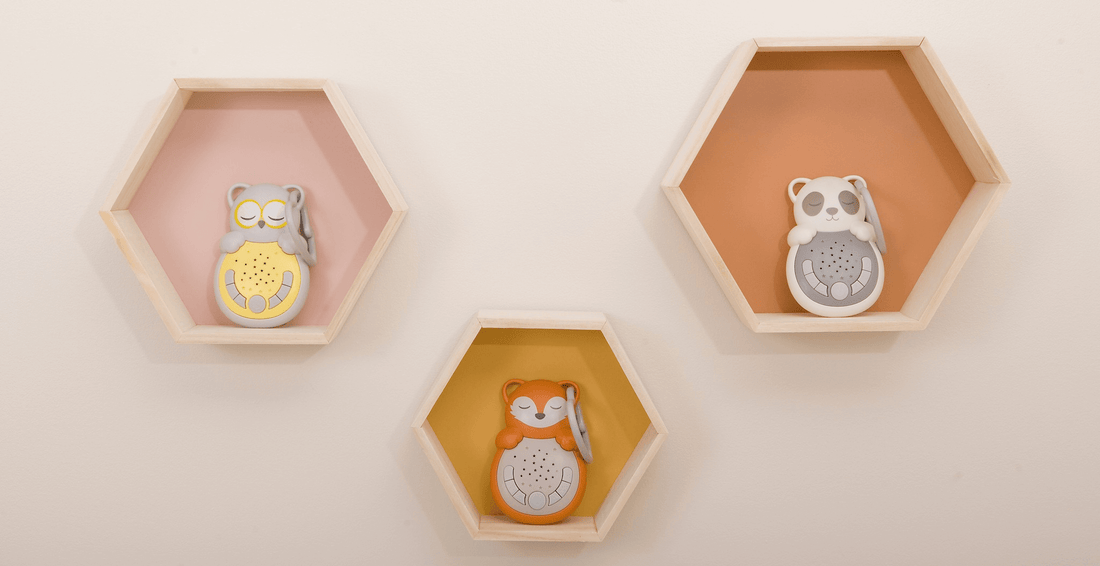 Three animal-shaped night lights displayed on hexagonal wall shelves.
