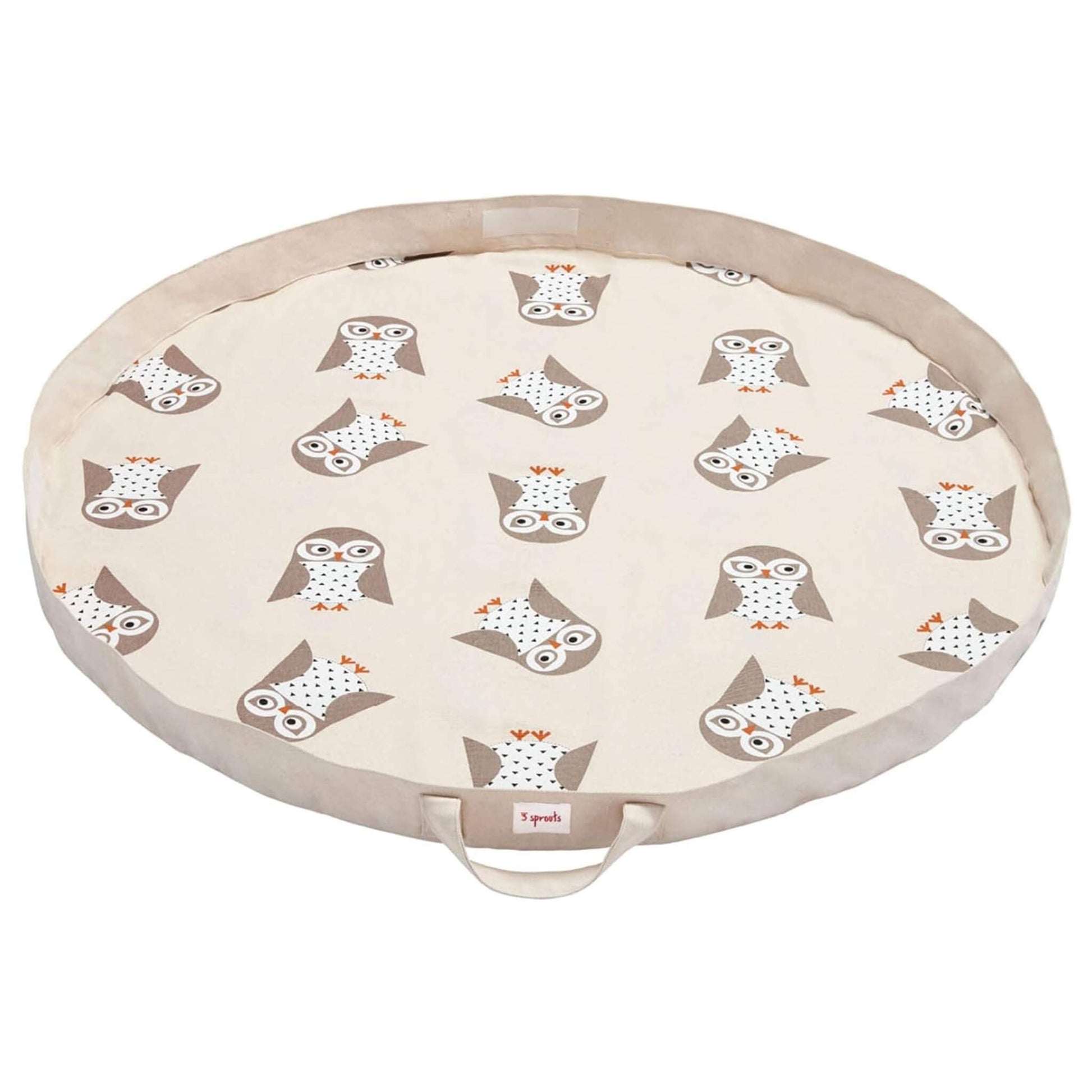 Soft circular play mat with beige trim and all-over owl print, shown fully open. Branded 3 Sprouts label on the front handle.
