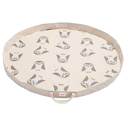 Soft circular play mat with beige trim and all-over owl print, shown fully open. Branded 3 Sprouts label on the front handle.