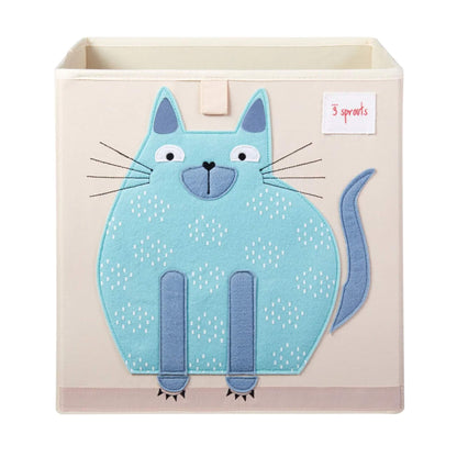 3 Sprouts Storage Box featuring a playful blue cat with stitched whiskers and a patterned body, set on a neutral beige fabric cube.