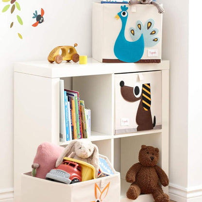 Dog-themed 3 Sprouts storage box displayed in a white cubby unit alongside other animal boxes, books, and toys in a child's room.