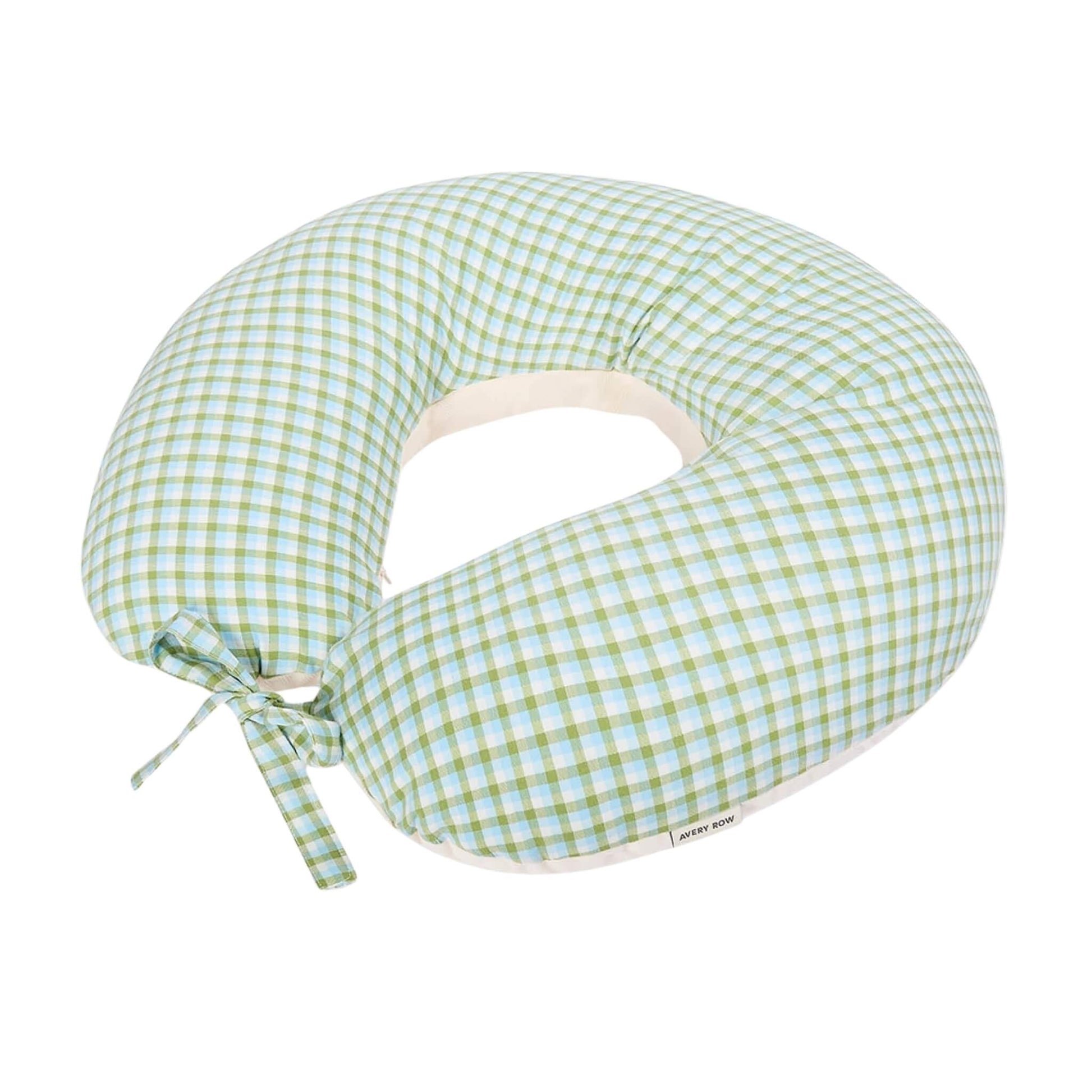 Avery Row Nursing Pillow in Greenhouse Gingham, with a curved supportive shape, soft organic cotton cover and tie fastening.