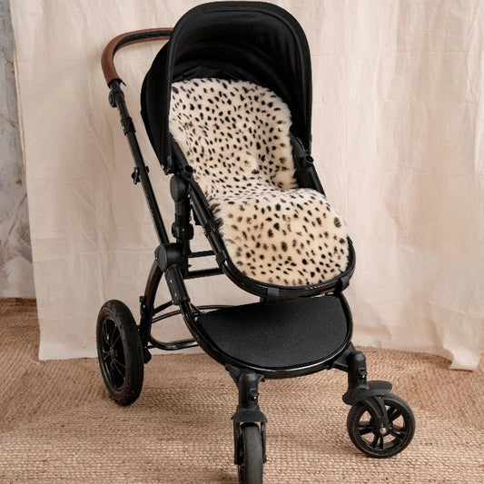 Baa Baby 100%  Merino Sheepskin Buggy Liner.  Designed to fit buggies such as the Bugaboo™ and with vertical openings which works with a 3 point or fixed 5 point harness.