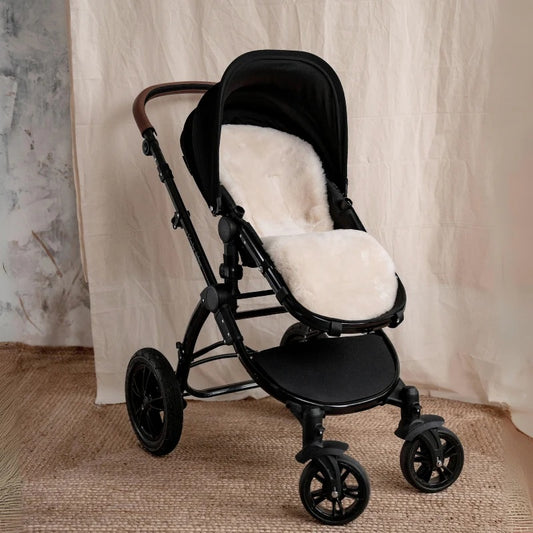 Baa Baby 100%  Merino Sheepskin Buggy Liner.  Designed to fit buggies such as the Bugaboo™ and with vertical openings which works with a 3 point or fixed 5 point harness.
