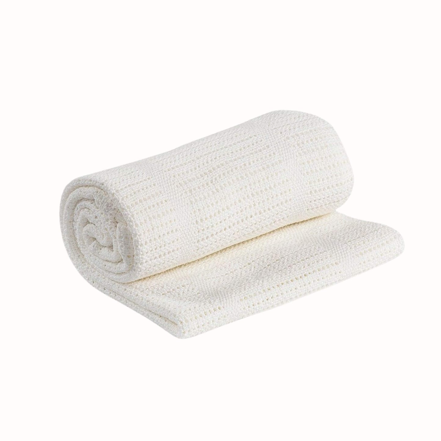 White knitted cellular baby blanket shown rolled with one section unfolded to display the breathable open weave texture.
