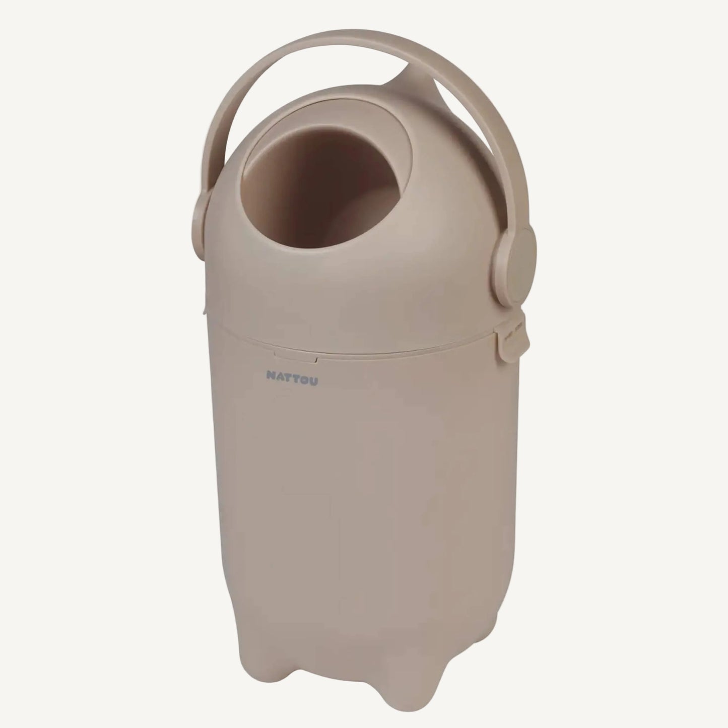 Closed taupe nappy bin with a rounded lid and carry handle shown against a light background.