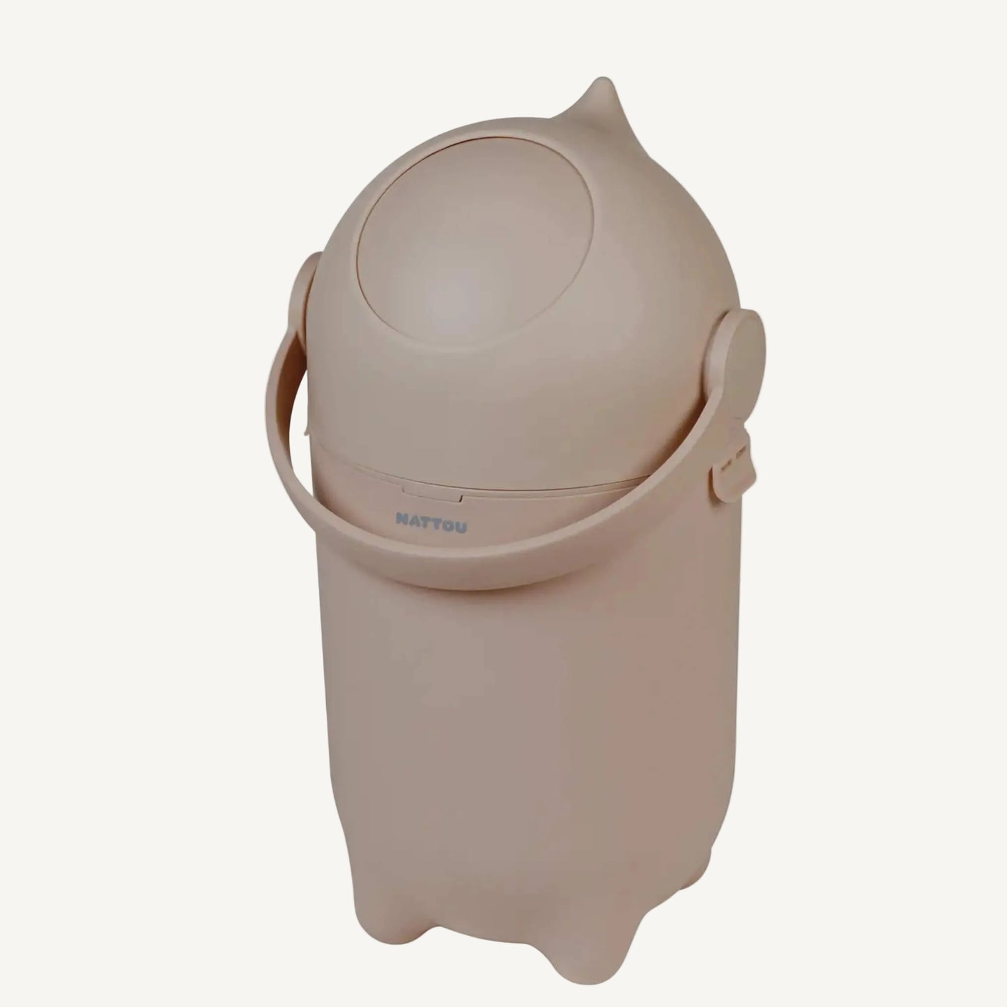 Taupe nappy bin with a rounded shape, carry handle and wide top opening shown against a light background.