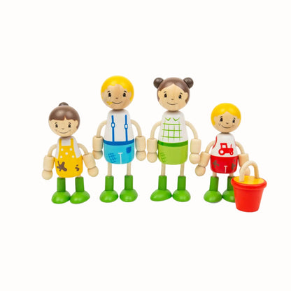 Four wooden farmer family dolls with movable arms and legs standing beside a red feeding bucket.