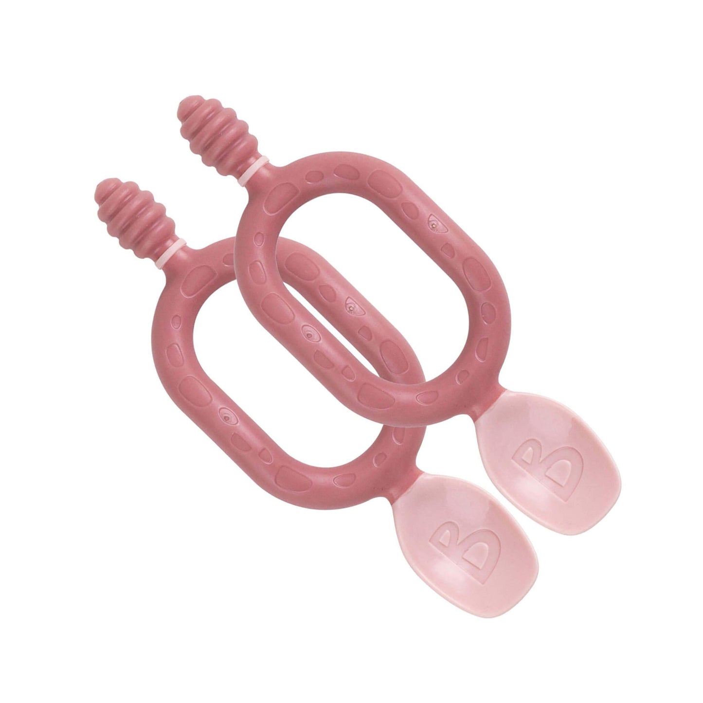 Two blush pink Bibado Dippit baby spoons with looped handles and dual-ended design, shown against a white background.
