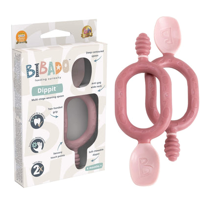 Twin-pack of Bibado Dippit spoons in blush pink shown alongside branded packaging highlighting spoon features.