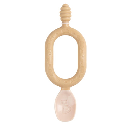 Single Bibado Dippit spoon in fawn beige with soft dipper end and scooping spoon end, designed for two-handed grip.