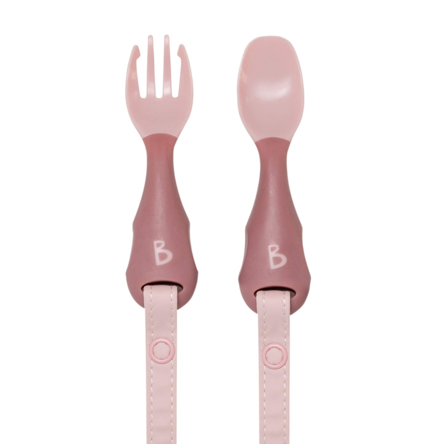 Close-up of Bibado Handi Cutlery in Blush, showing ergonomic spoon and fork with attachable popper straps.