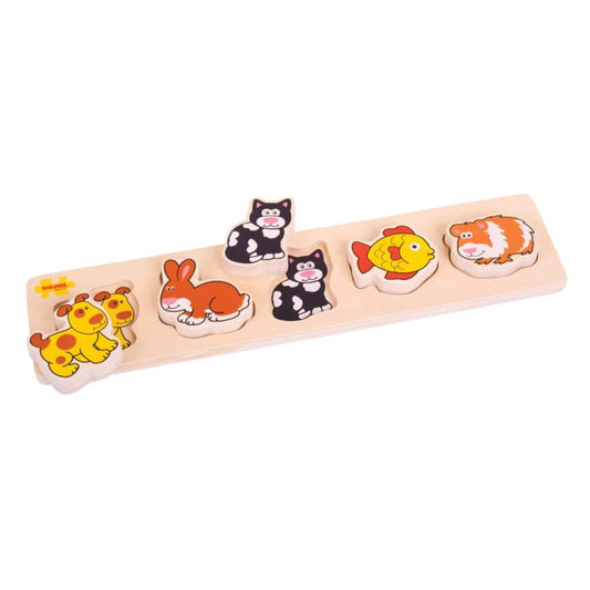 Bigjigs Toys Chunky Lift and Match Pets Puzzle with sturdy wooden pieces shaped like familiar pets, including dog, cat, rabbit, fish, and guinea pig, perfect for little hands to grasp and match.