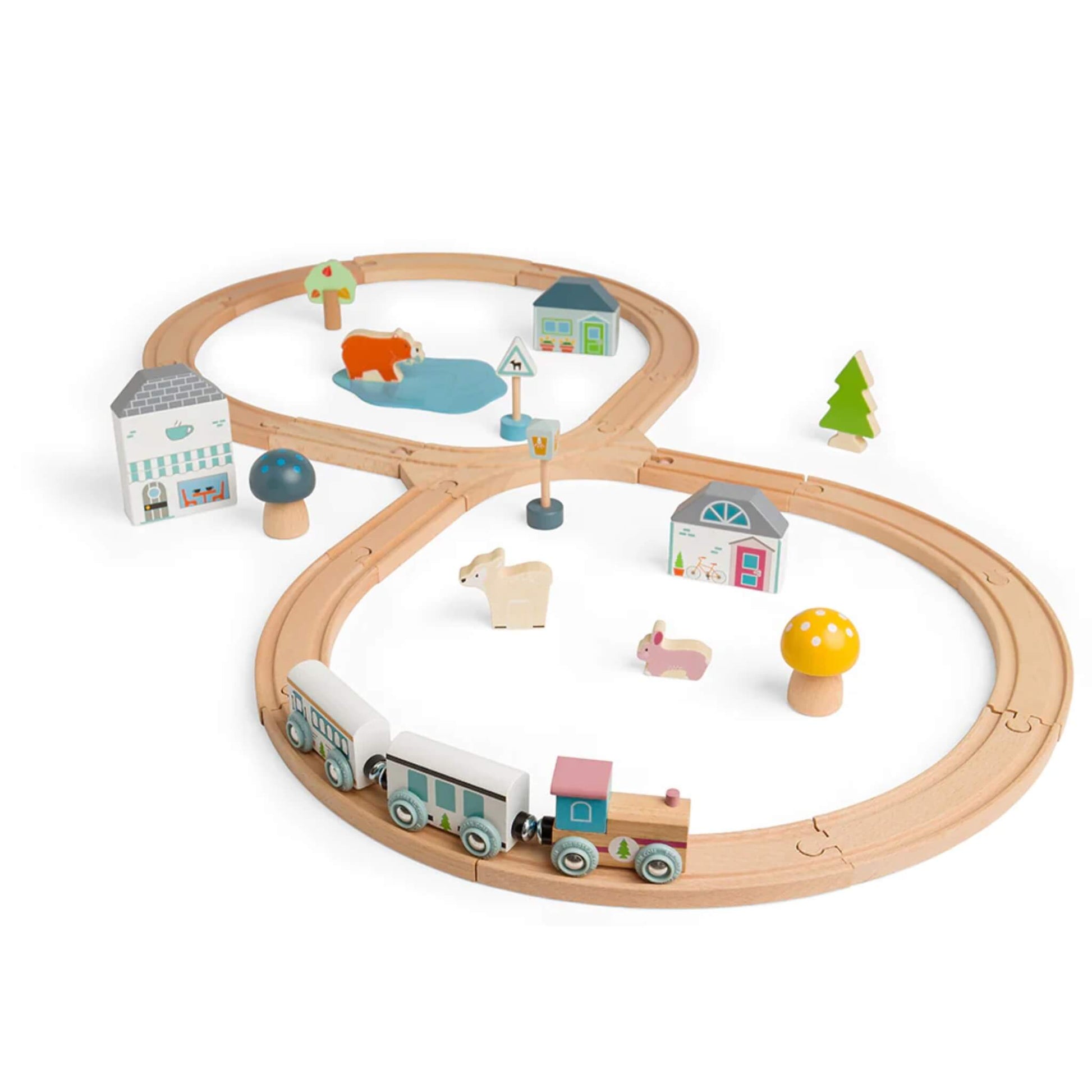 The pastel-coloured train navigating the wooden track while a deer and rabbit look on from the village layout.