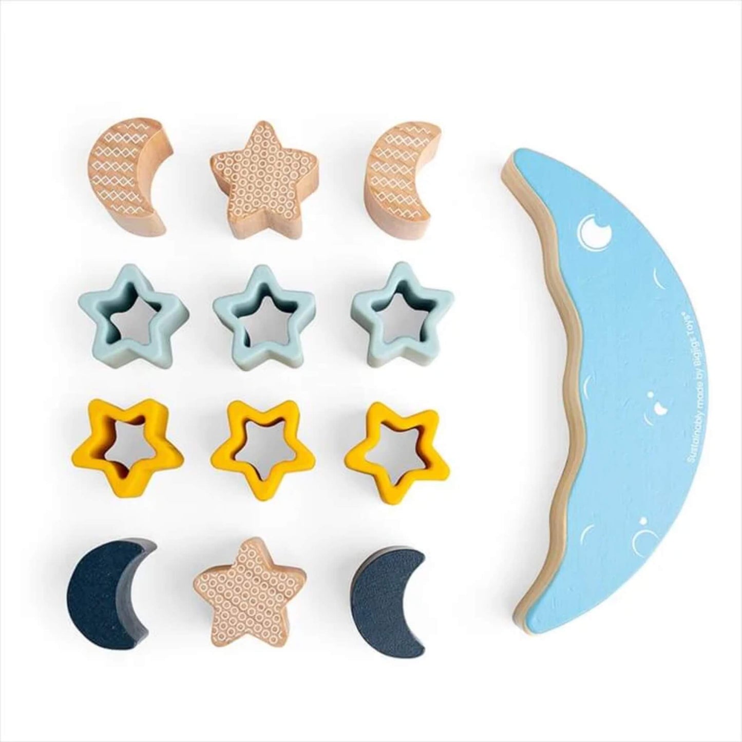 Flat lay of the Bigjigs Moon Balance Stacker set, showing the full set of wooden and silicone pieces alongside the blue curved moon base.