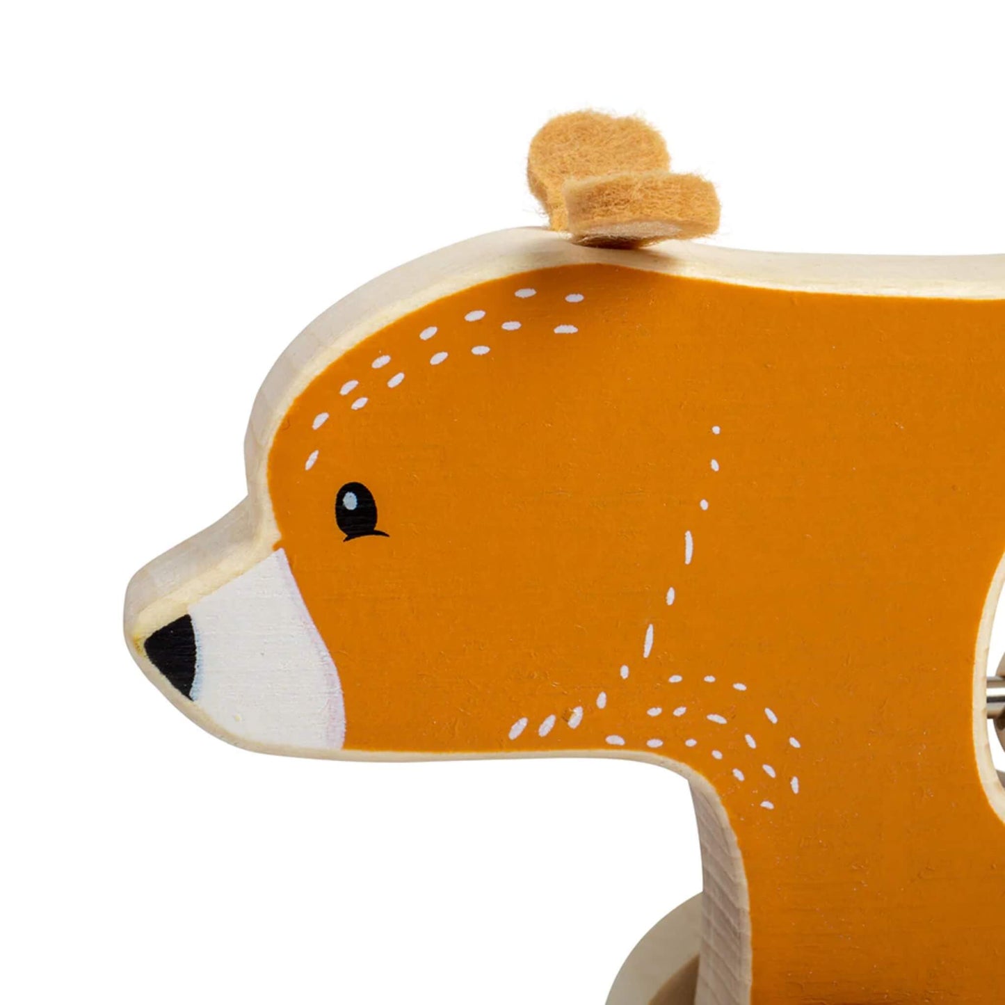 Close-up of the bear’s head, highlighting the soft felt ears and hand-painted facial details on the natural wood finish.