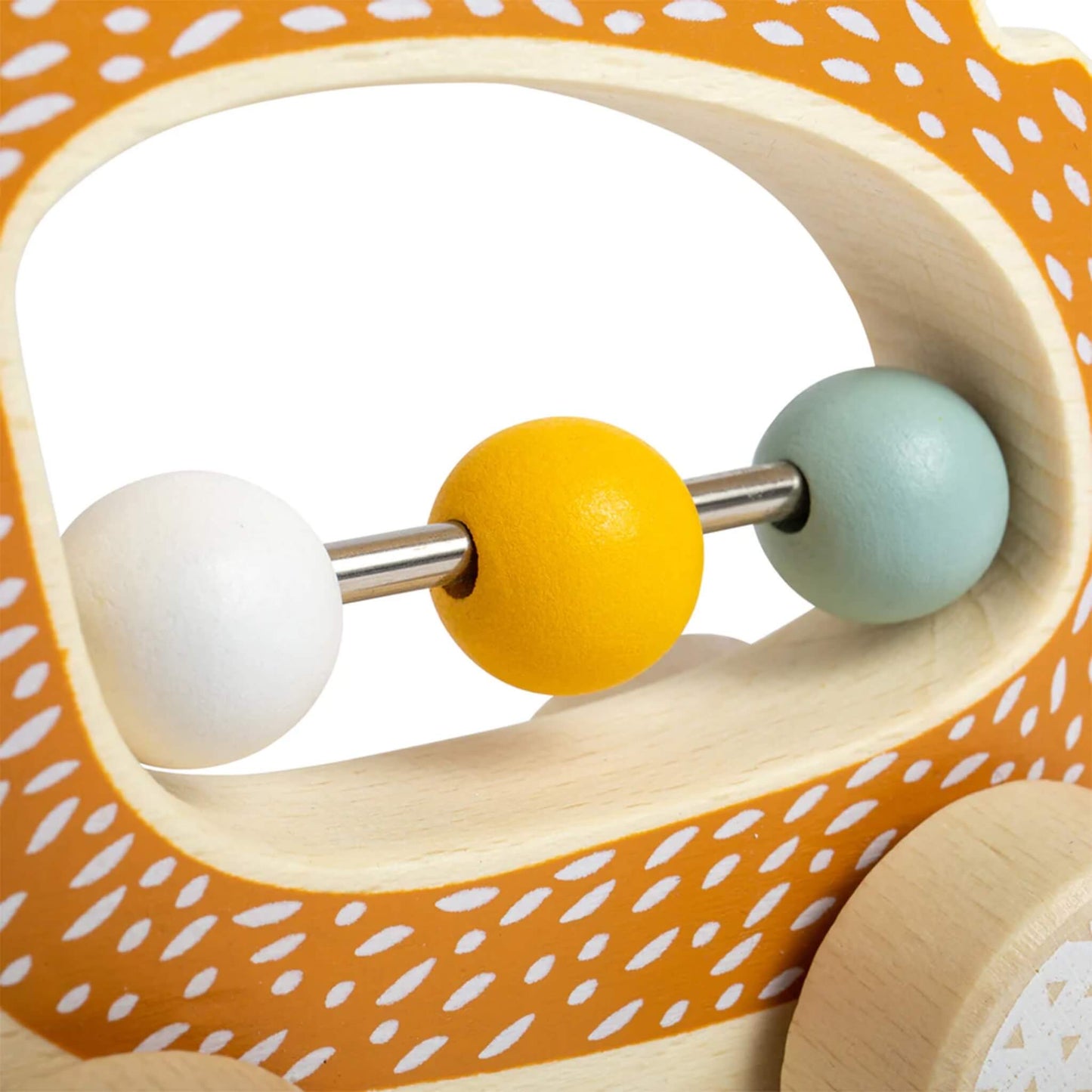 Close-up of the three wooden beads in the hedgehog’s belly—white, yellow, and pale blue—attached to a metal rod for fine motor play.