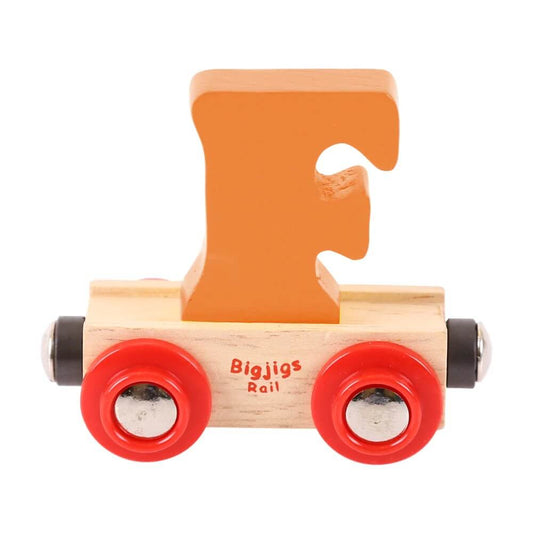 Orange wooden rail name letter F, set upon a wooden carriage.