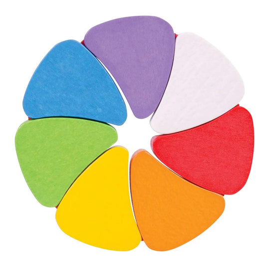 Bigjigs Toys Rainbow Petals puzzle arranged in a flower shape, featuring seven brightly coloured wooden segments in red, orange, yellow, green, blue, purple and white.