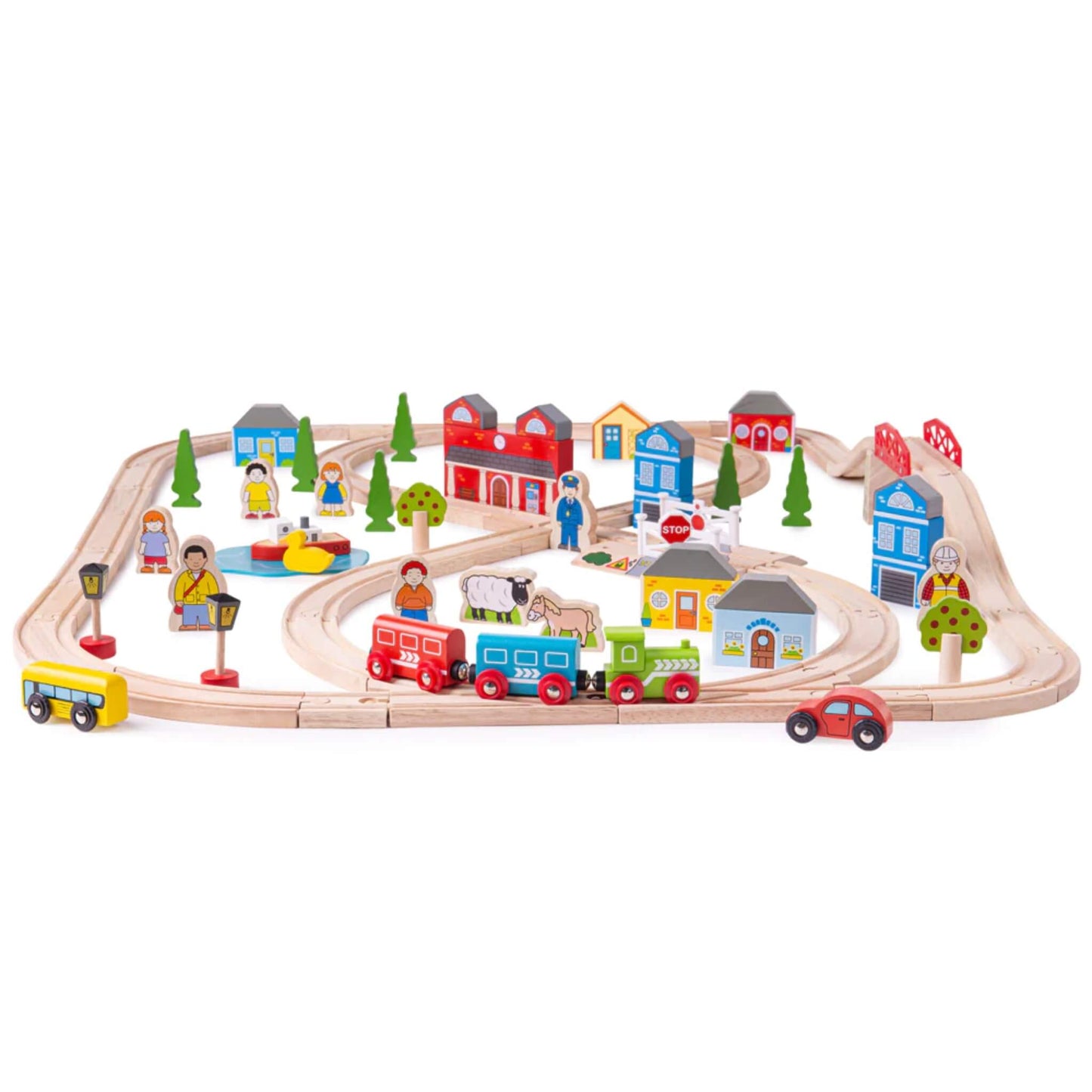 Wooden train layout from the Bigjigs Toys Town & Country Train Set, featuring a colourful engine, carriages, town buildings, farm animals, and play figures arranged on a multi-loop wooden track.