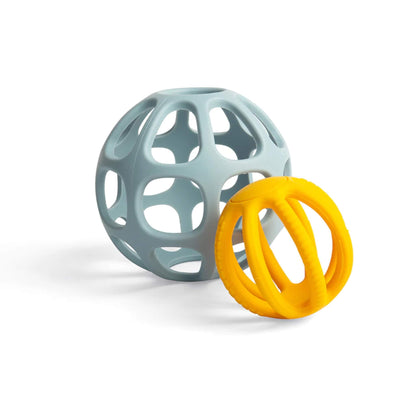 Bigjigs Toys Activity Balls set with the yellow teething ball placed beside the grey ball, both showing textured details.