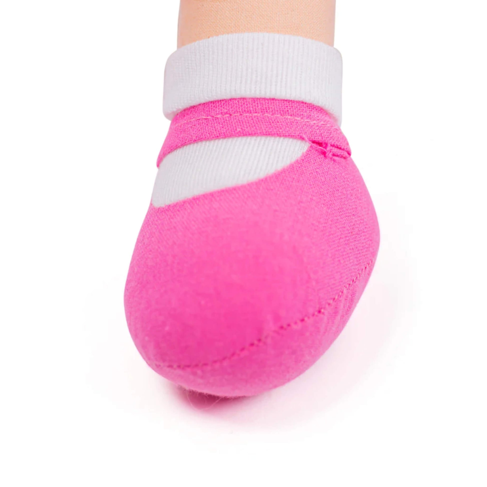 Zoomed-in view of Emma's pink shoe with white sock detail.