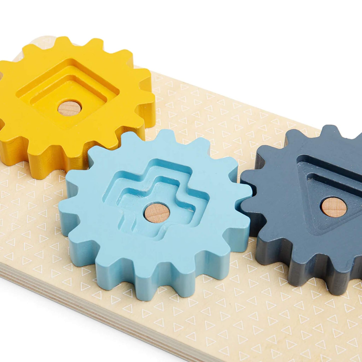 Close-up of yellow, blue, and grey cogs with textured shapes, ready for spinning and sorting.