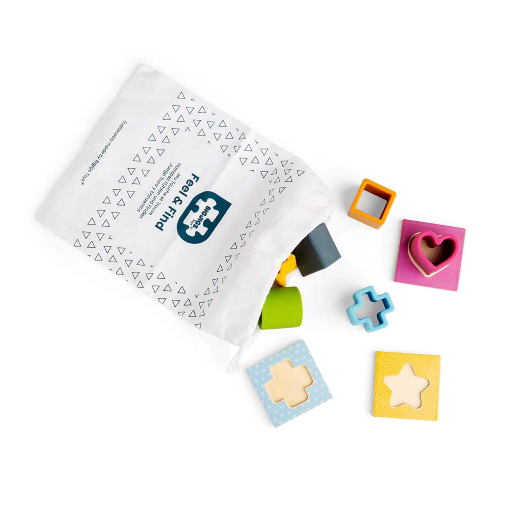 Drawstring bag tipped over with colourful shapes and matching tiles spilling out, ready for little hands to explore.