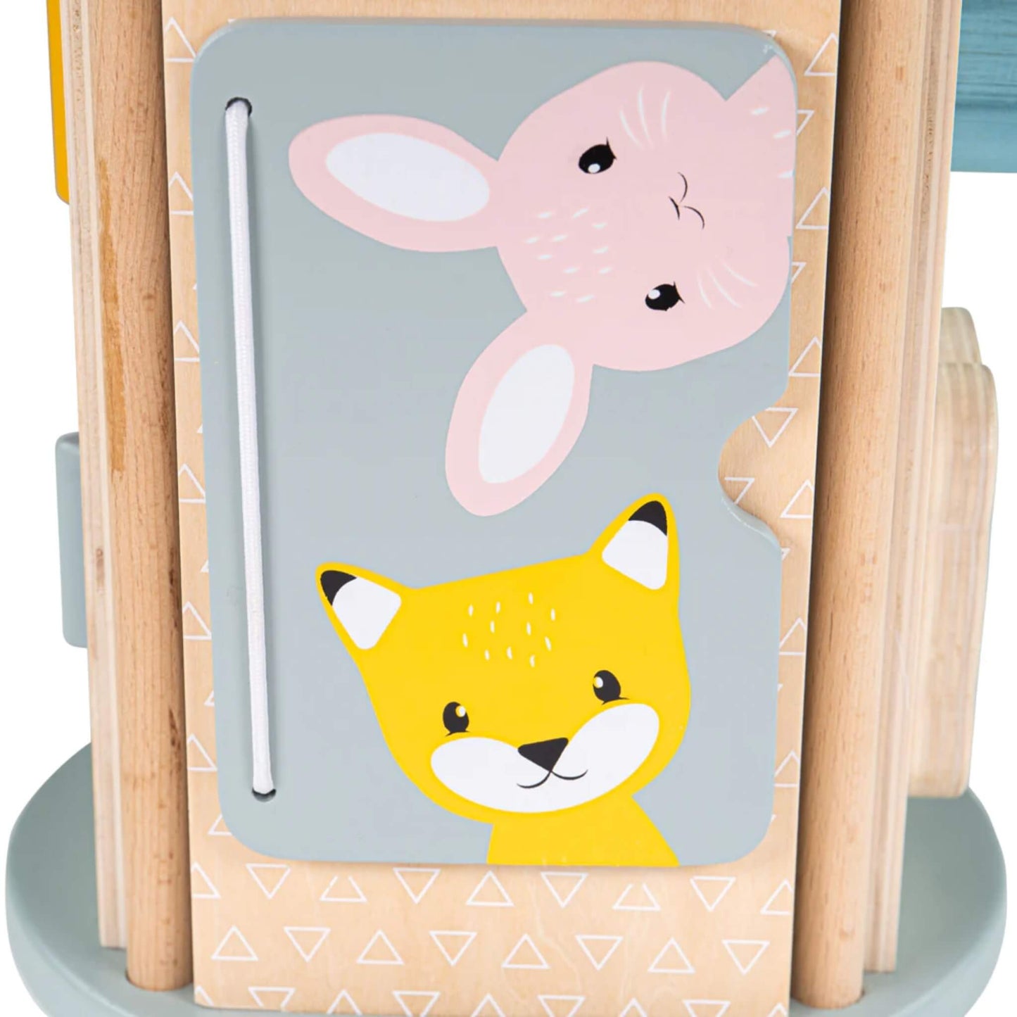 Illustrated flip book panel showing a bunny and a fox character on a grey background, attached with white elastic.