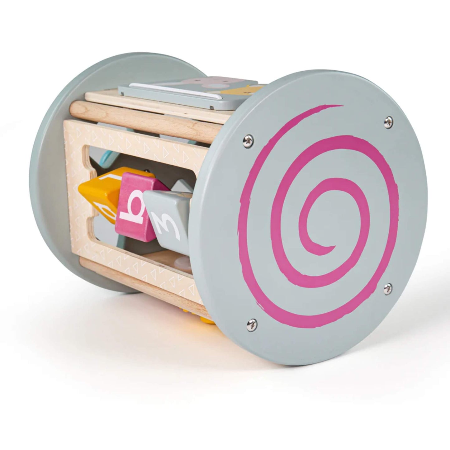 Side panel of the toy showing the large pink swirl on the end disc, with shape blocks peeking through the frame.