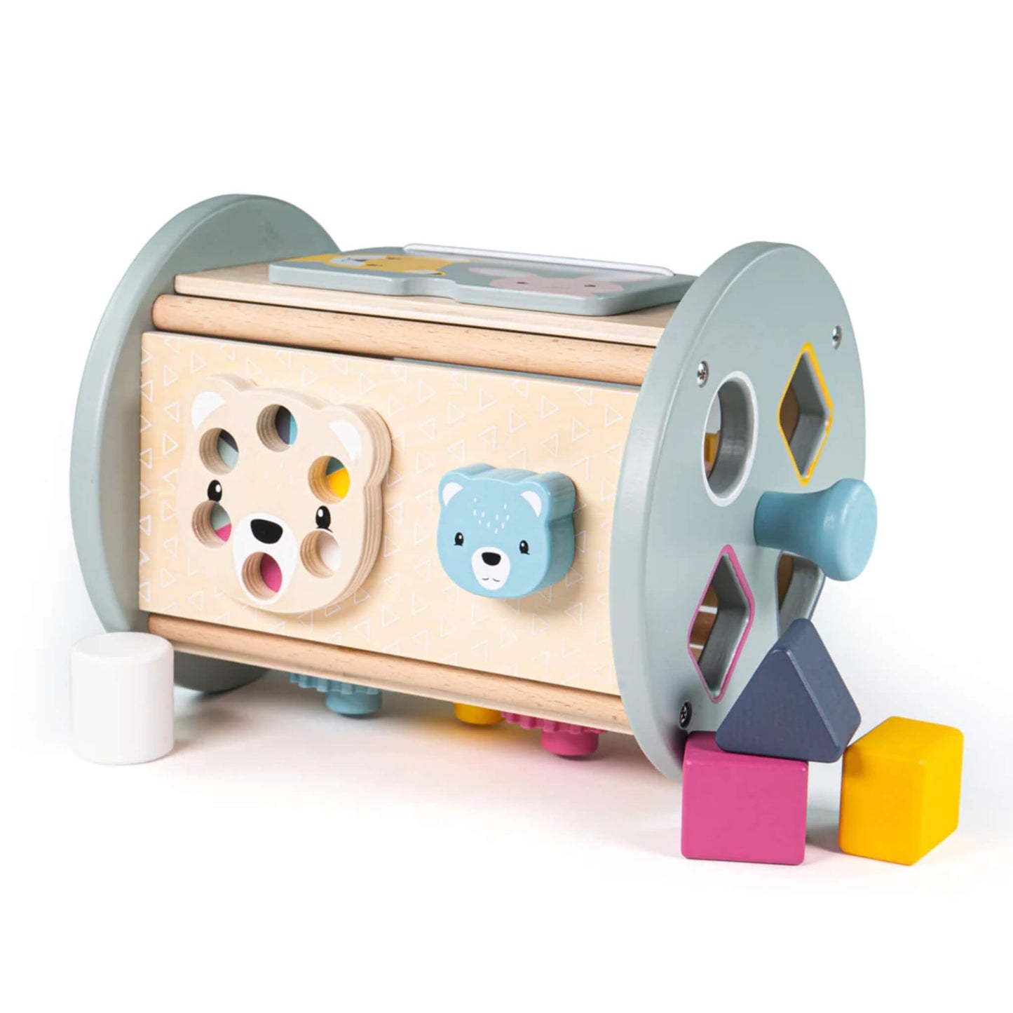 The activity sorter on its side, showing both the animal face dial and shape sorter knobs, with wooden blocks placed in front.