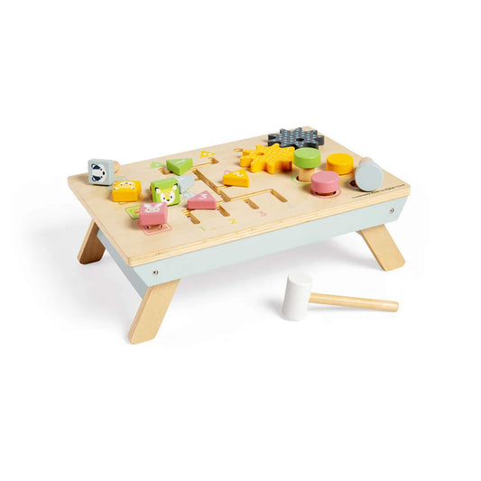 A wooden tabletop activity bench by Bigjigs Toys featuring colourful wooden pegs, shapes, animal bolts, and cogs, with included wooden mallet.