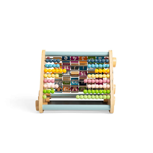 Top-down view showing pastel abacus rows and numbered rotating blocks for counting and fine motor development.