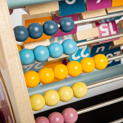 Close-up of coloured wooden abacus beads, highlighting tactile detail and smooth finish.