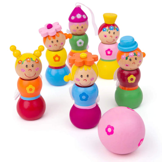 A full set of Bigjigs Toys Fairy Skittles with six brightly coloured wooden fairies and one pink wooden ball, displayed against a white background.
