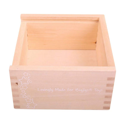 Sturdy wooden base for sorting shapes and storing pieces.