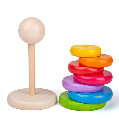 Wooden stacking base with colourful rings and natural topper, ready for stacking play.
